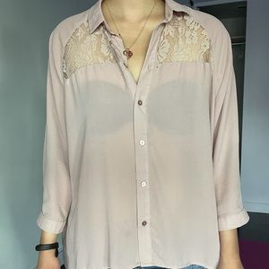 Neutral pink flowy blouse with floral lace details